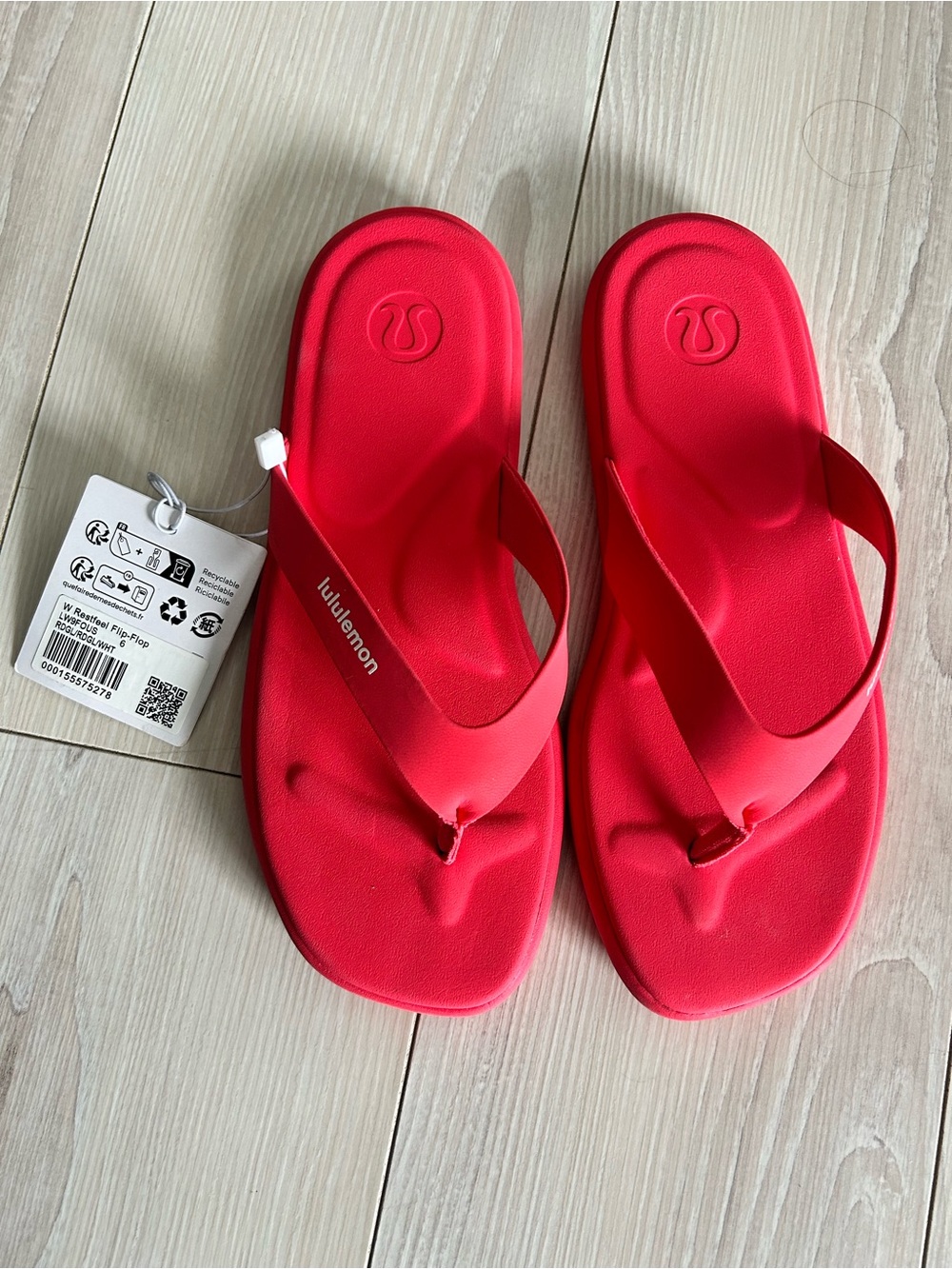 lululemon Restfeel Women’s bright pink flip flops